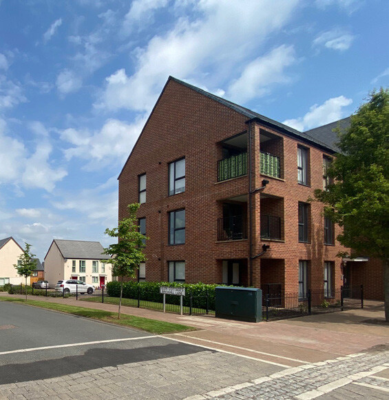 A photo showing apartments adding variety to corner streets