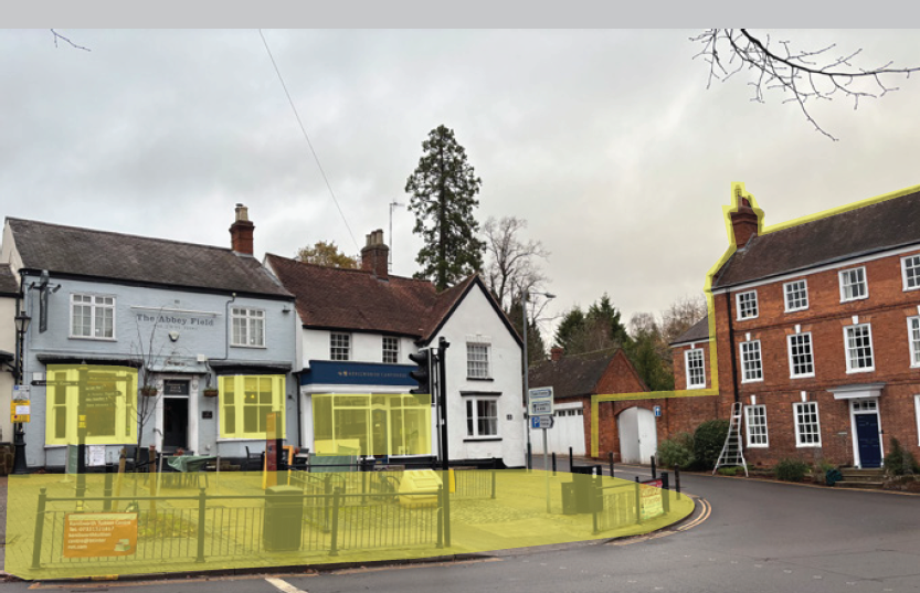 A photo of High Street in Kenilworth showing public space enclosed by a strong building line and active frontage, with a landmark building
