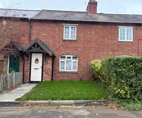 A photo of cottages on Coventry Road