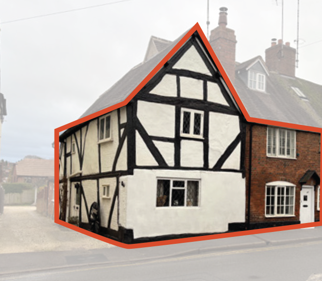 Photo of a tudor building.